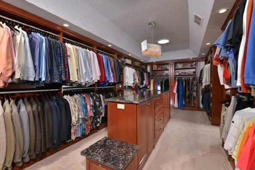 Custom walk-in closet design by Tamer Construction
